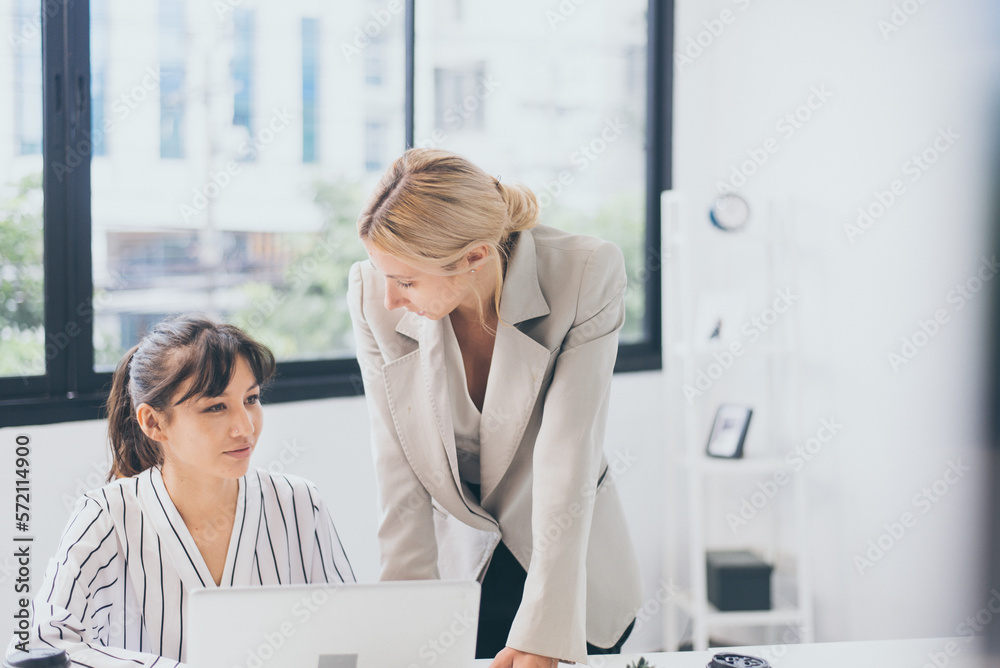 Businesswoman sharing ideas and working a new project in office,Business teamwork concept Businesswoman sharing ideas and working a new project in office,Business teamwork concept