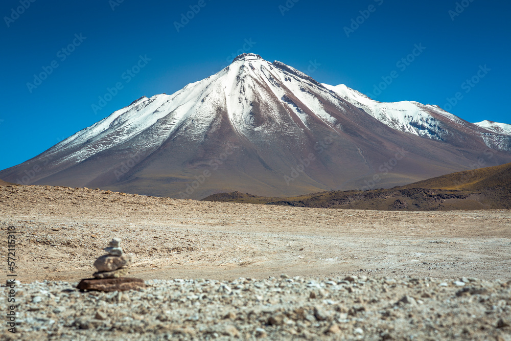 Dramatic volcanic landscape in Piedras Rojas at sunny day, Atacama Desert, Chile