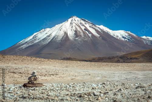 Dramatic volcanic landscape in Piedras Rojas at sunny day, Atacama Desert, Chile