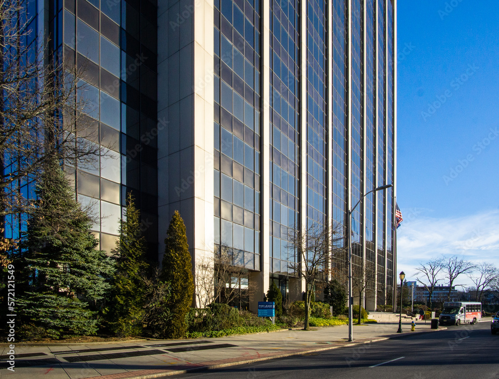 White Plains, NY - USA - Feb 10, 2023 Three quarter view of the 21-story, Westchester One. Located at 44 South Broadway and home to the New York Life Insurance Company’s White Plains Home Office.