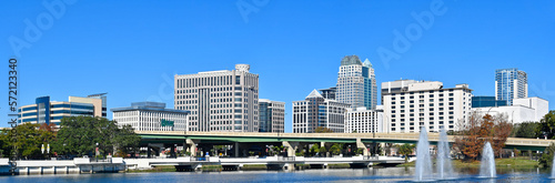Panoramic view of downtown Orlando skyline with condo and business buildings in Orange County, Orlando, Florida, USA.