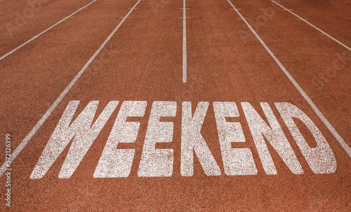 Weekend written on running track, New Concept on running track text in white color