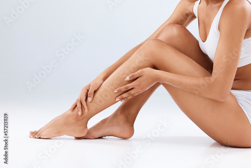 Murais de parede Woman, skincare and beauty legs for wellness, laser hair removal and studio background