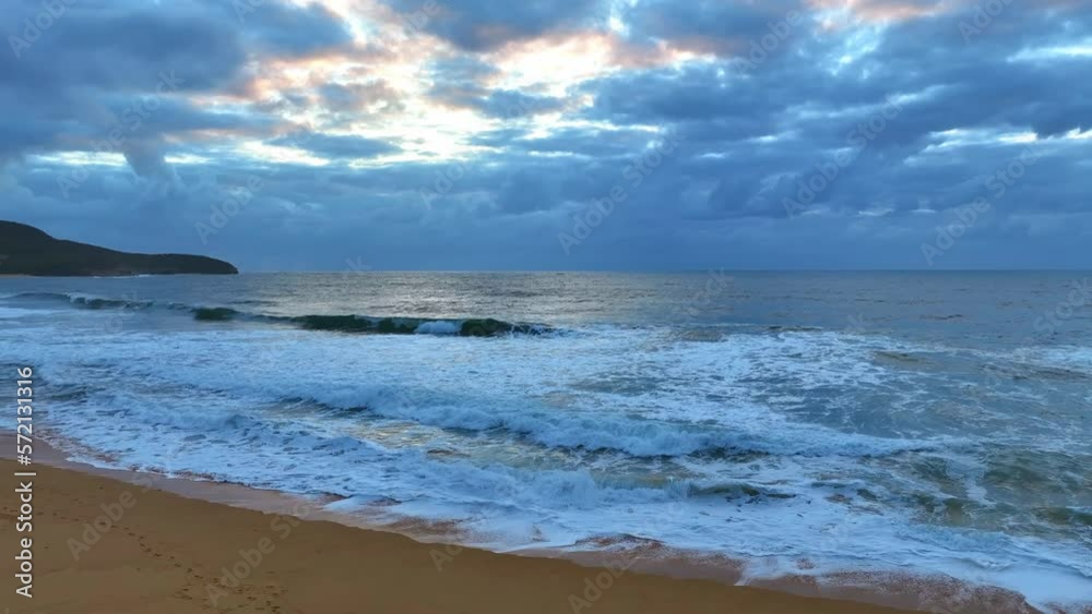 Aerial sunrise seascape with clouds at Killcare Beach on the Central Coast, NSW, Australia. Aerial sunrise seascape with clouds at Killcare Beach on the Central Coast, NSW, Australia.