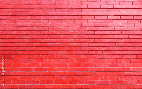 Red brick wall of light red stone background texture