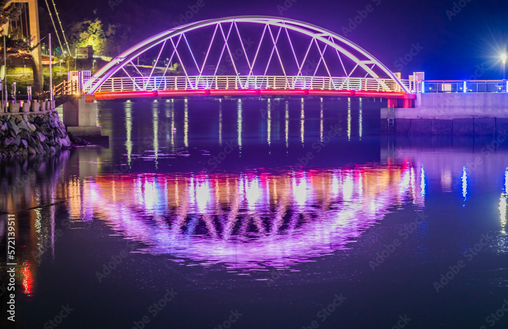 Fototapeta premium Pedestrian bridge across small seaport