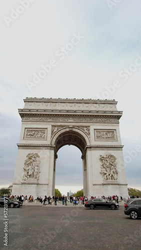 The Arch of Triumph (Arc de Triomphe de l'Étoile) famous monument in Paris photo