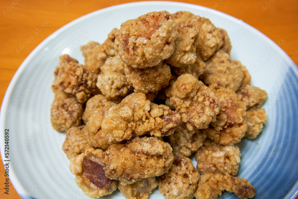 A plate of crispy and delicious fried crispy meat close-up A plate of crispy and delicious fried crispy meat close-up