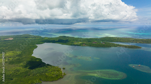 Fototapeta Naklejka Na Ścianę i Meble -  Top view of island with jungle and blue sea. Seascape in the tropics. Balabac, Palawan. Philippines.