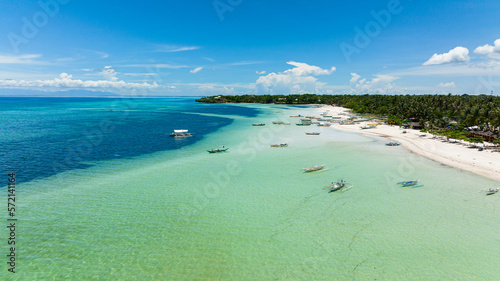 Aerial view of tropical sandy beach with palm trees. Bantayan island, Philippines. © Alex Traveler