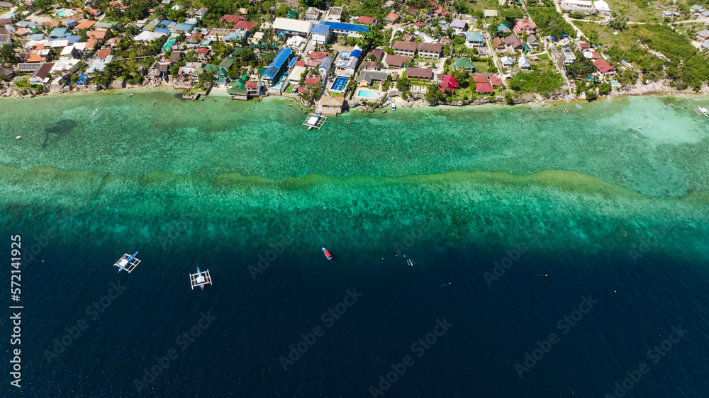 Shore of Moalboal with hotels and dive centers. A popular place for divers. Philippines, Cebu.