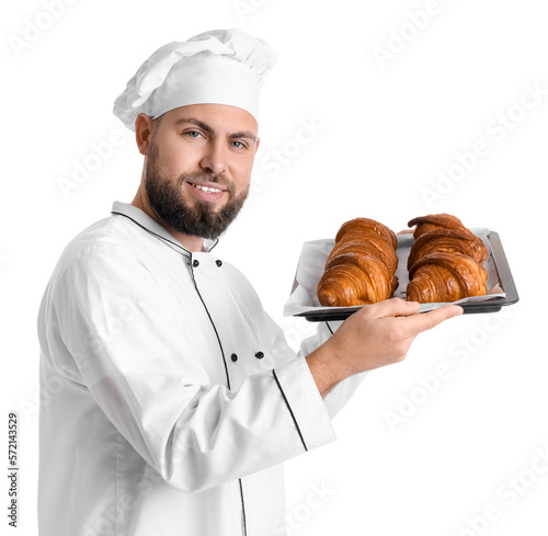 Male baker with tray of tas...