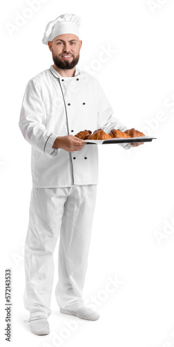Male baker with tray of tas...