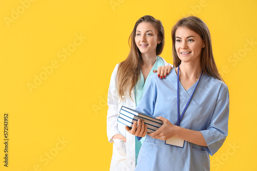 Female doctor and intern wi...