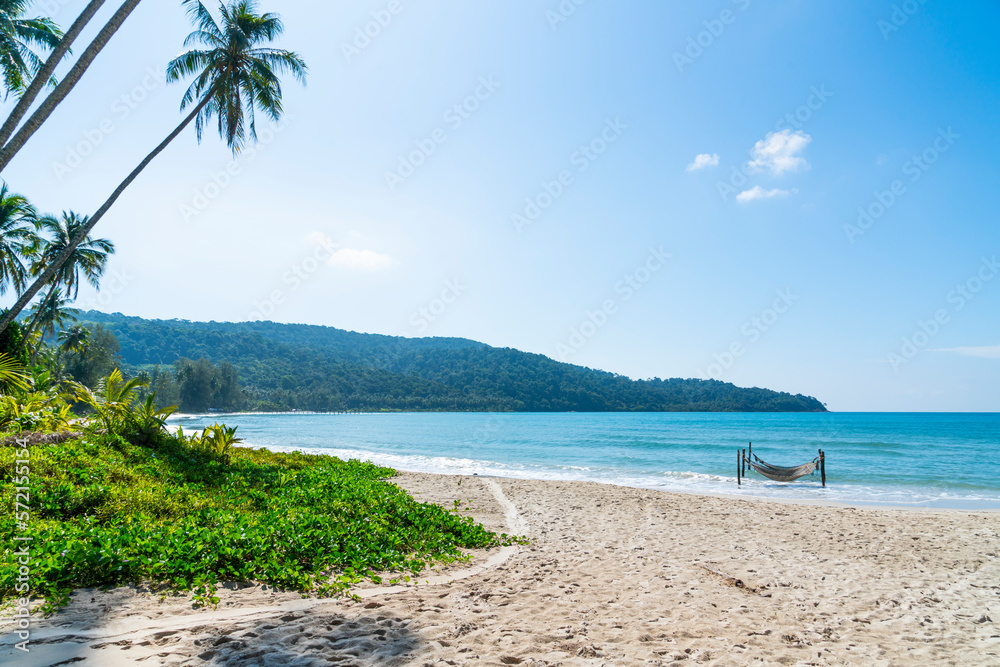 Beautiful beach with green palm tree in Koh Kood island at Trat Thailand. blue sea and sky background