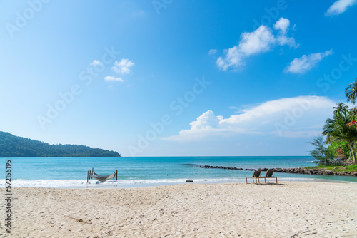 sun loungers chair on beautiful beach in Koh Kood island at Trat Thailand. blue sea and cloud on sky background