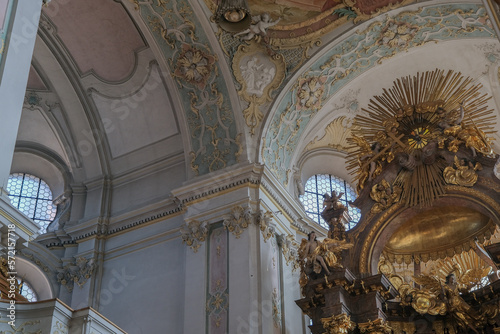 Magnificent opulent splendid Bavarian baroque church cathedral basilica interiors with stucco  murals  altar  Pilars  ceiling paintings  gold  wood domes nave