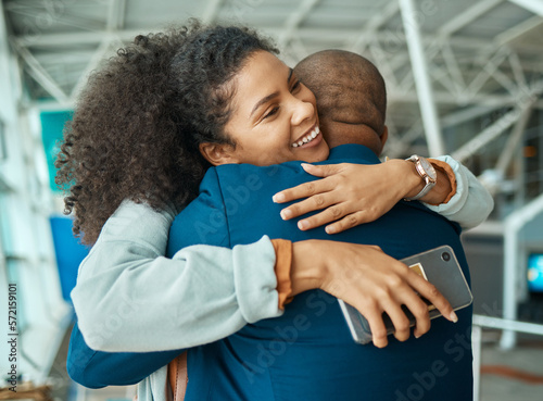 Black people hug, reunion at airport and travel with love, care and relationship, happy to see partner after trip with couple. Hello, happiness and commitment, together and embrace with greeting