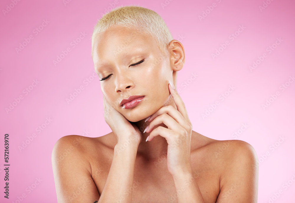 Woman, face and hands in beauty skincare cosmetics, makeup or facial treatment against a pink studio background. Female hand touching soft, smooth or gentle skin in satisfaction for self love or care Woman, face and hands in beauty skincare cosmetics, makeup or facial treatment against a pink studio background. Female hand touching soft, smooth or gentle skin in satisfaction for self love or care