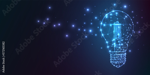 Bulb launch, wire frame polygonal style. Glowing light bulb isolated on dark blue. Creative idea, patent, digital solution, future technology photo