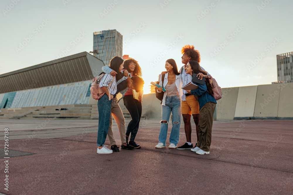 Obraz premium University students socializing in city.