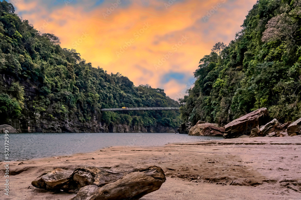 sunset over the Umngot river Meghalaya, India sunset over the Umngot river Meghalaya, India