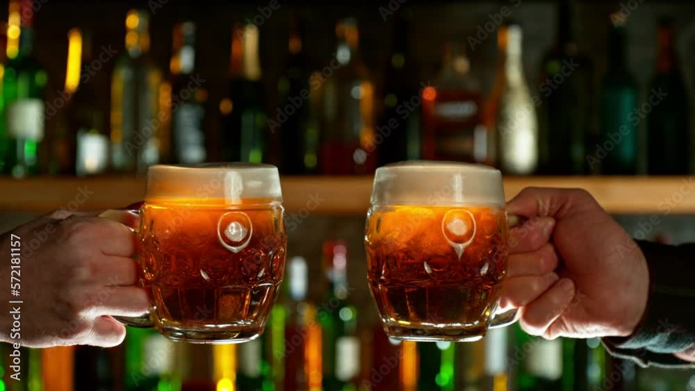 Super Slow Motion Shot of Clinking Two Pints of Beer. Filmed on high speed cinematic camera at 1000fps