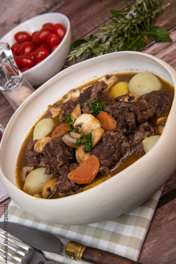 Beef bourguignon recipe, beef stew with wine sauce and vegetables. High quality photo Beef bourguignon recipe, beef stew with wine sauce and vegetables. High quality photo