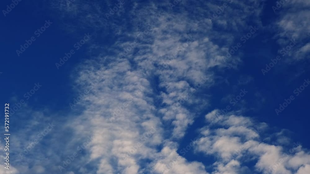 blue sky with clouds reflection in calm water blue sky with clouds reflection in calm water