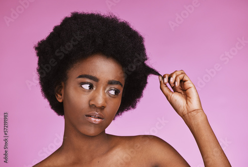 Natural, hair and black woman with afro in studio for beauty, wellness and grooming on purple background. Haircare, hairstyle and face of girl model relax in luxury, hygiene or routine isolated