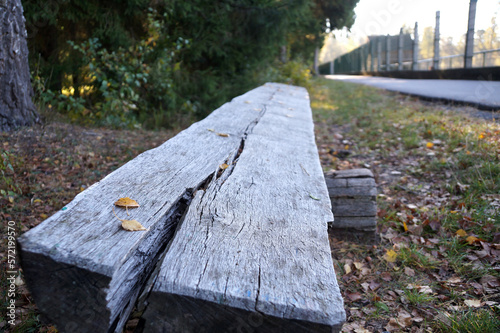 An old unpainted bench in the park