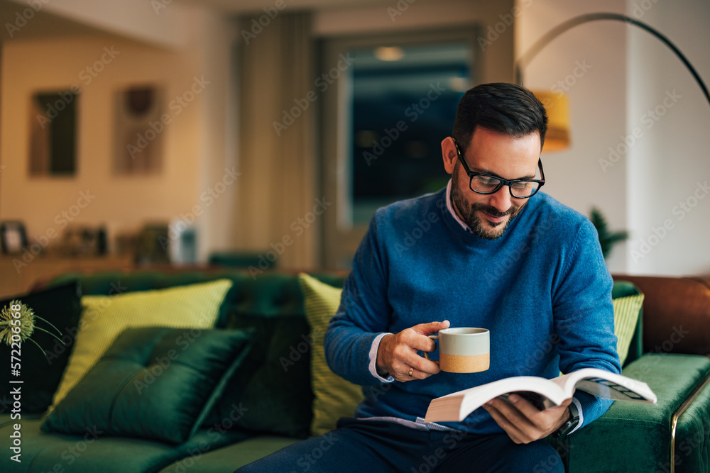 Businessman reading a book and planning a new work project. Businessman reading a book and planning a new work project.