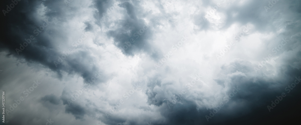 Dramatic cloudscape texture. Dark heavy thunderstorm clouds before rain. Overcast rainy bad weather. Storm warning. Natural gray background of cumulonimbus. Nature backdrop of stormy cloudy sky. Dramatic cloudscape texture. Dark heavy thunderstorm clouds before rain. Overcast rainy bad weather. Storm warning. Natural gray background of cumulonimbus. Nature backdrop of stormy cloudy sky.