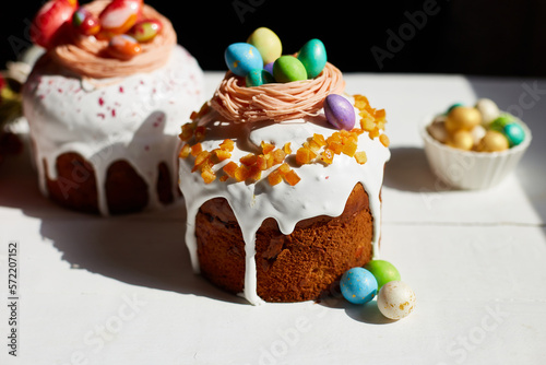 Easter cake with chocolate eggs decoration, on white wooden table the holiday, Happy Easter Holiday.