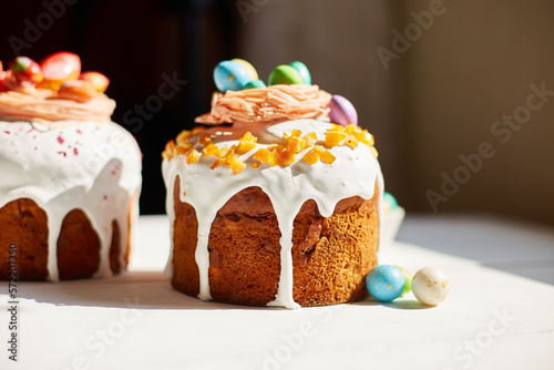 Easter cake with chocolate eggs decoration, on white wooden table the holiday, Happy Easter Holiday.