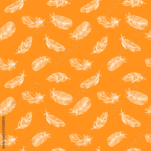 Feather seamless pattern on orange background. Vintage card for fabric design. Peacock feather