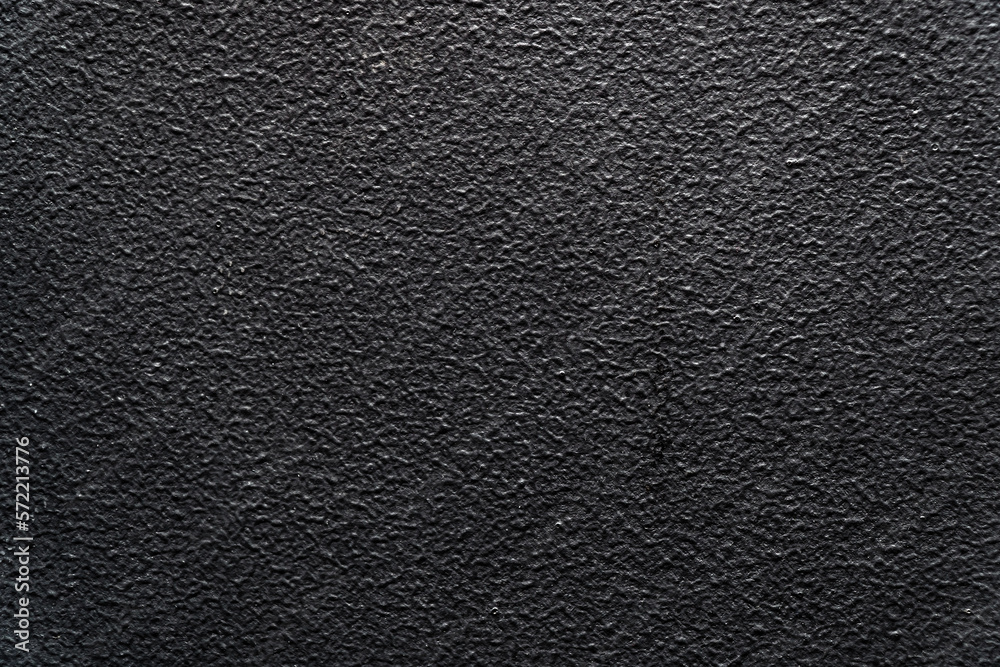 The texture of the black plastic ribbed surface for background The texture of the black plastic ribbed surface for background