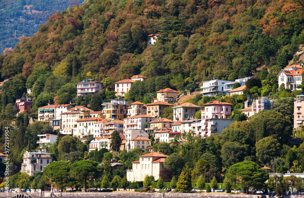Small town on green hill in summer, Italy