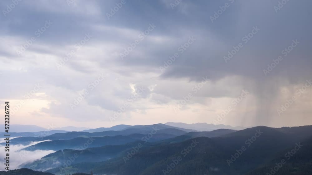 Overcast clouds covered the sky over the Rhodope Mountains with spruce forests and meadows Overcast clouds covered the sky over the Rhodope Mountains with spruce forests and meadows