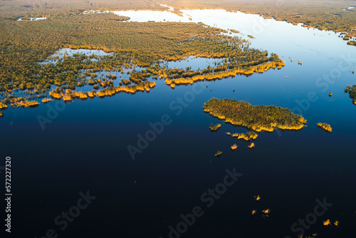 Sunrise over Comana Natural Park. Aerial view of this beautiful natural park with lakes birds and reed, landmarks of Romania. Amazing delta landscape.
