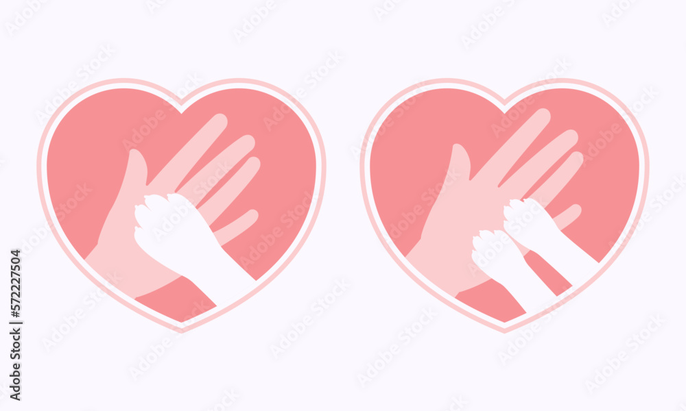 Dog and cat paws on hand in heart shaped frame Dog and cat paws on hand in heart shaped frame