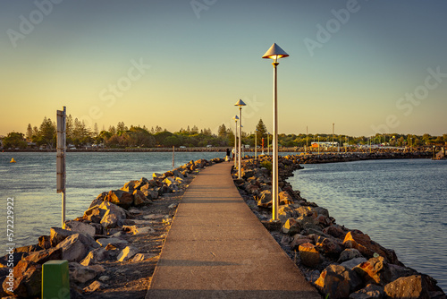 Pier along the Coolongolook river in Forster, New South Wales, Australia photo