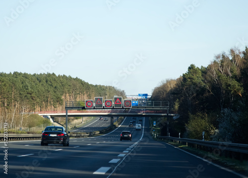 High-speed road with speed limit signs