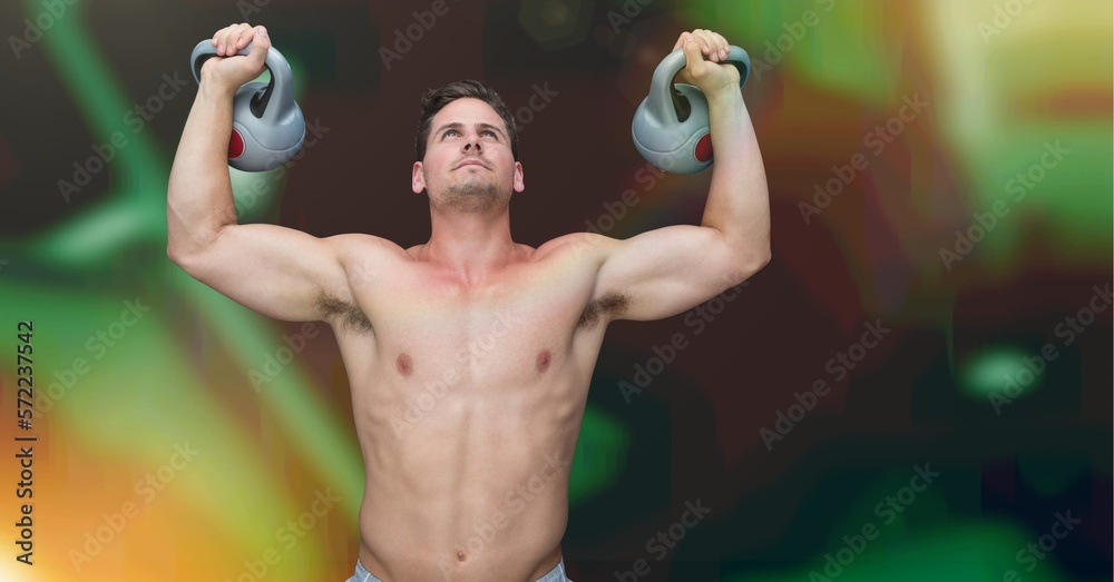 Fototapeta premium Composition of muscular strong caucasian man lifting kettlebells