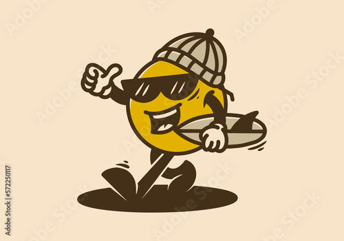 Yellow ball character wearing beanie and holding a surfing board