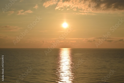 sunset over the sea © KORJUDZ