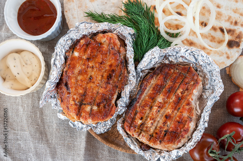 Grilled pork meat in foil w...