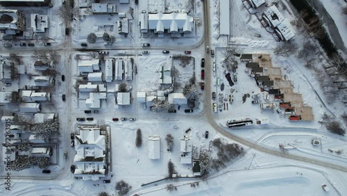 Aerial view of Whitefish, Montana on a cloudy winter day with the Rockies n the background