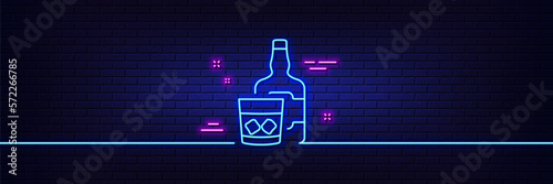 Neon light glow effect. Whiskey glass with ice cubes line icon. Scotch alcohol sign. 3d line neon glow icon. Brick wall banner. Whiskey glass outline. Vector