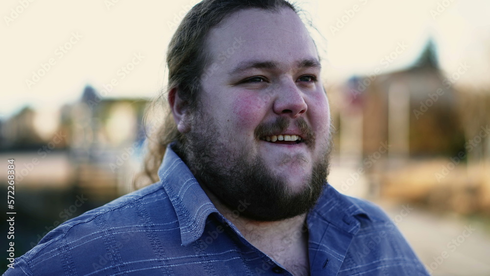 One excited overweight man standing outdoors having positive thoughts. Happy male caucasian person feeling excitement One excited overweight man standing outdoors having positive thoughts. Happy male caucasian person feeling excitement